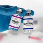 Relationship between Testosterone and Sexual Desire Men Gloved hand holding estrogen and testosterone vials