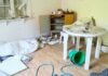 The Science of Clutter: How Home Organization Alters Your Cortisol Cluttered room with overturned bucket and messy table