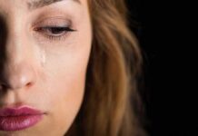 Stop Tears FAST With This Odd Tongue Trick woman's face with a tear on her cheek