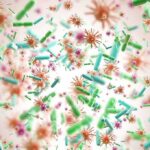 Oprah Sounds Alarm On Young Cancer Colorful microscopic bacteria and viruses floating in space