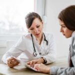 Silent Osteopenia Crisis — Who’s at Risk? Doctor consulting a patient at a desk