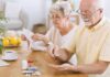 Hypertension Pills: Missed Doses, Zero Heart Shield Older couple organizing medication at a kitchen table