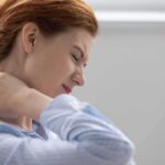 Kitchen Spice Eases Soreness – Real Science Backs It Woman holding her neck in pain