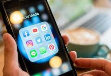 Meta’s Muse Builds Files On Everyone Hands holding a smartphone showing social media app icons