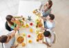 Group of friends eating lunch at a cafeteria table