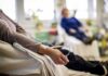 Diet Choice Tied To Deadly Cancer Recurrence Patient arm with IV line in a hospital chair